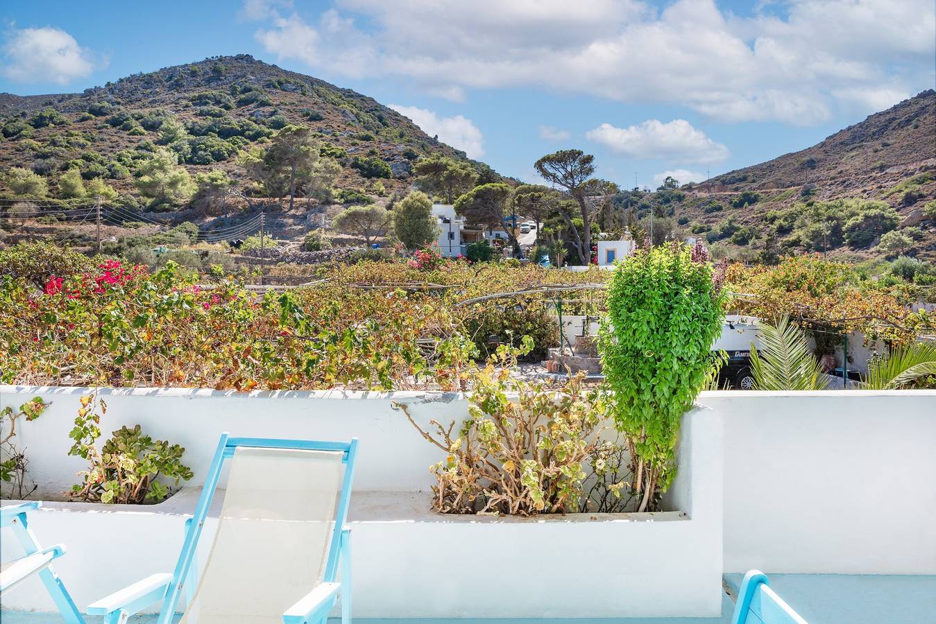 Casa de vacaciones 'Beachfront Lampis Dolphin 3' con vistas a la montaña, Wi-Fi y aire acondicionado in Archipiélago del Dodecaneso