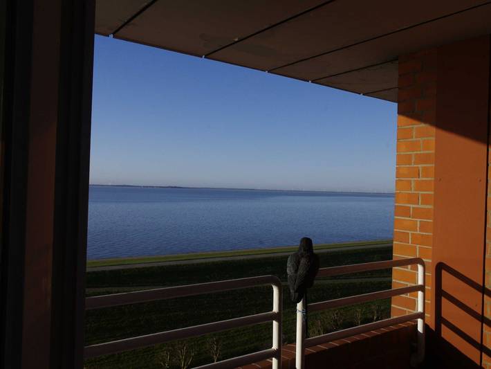 Ferienwohnung mit Meerblick für 2 Personen, mit Balkon und Ausblick am Jadebusen