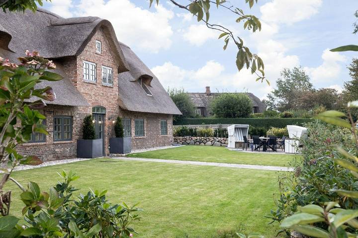 Ferienhaus für 7 Personen, mit Terrasse und Garten sowie Sauna in Tinnum