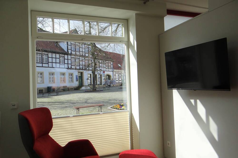 Ganze Wohnung, Modernes Appartement mit Kamin in denkmalgeschütztem Fachwerkhaus am Marktplatz in Bad Essen, Wiehengebirge
