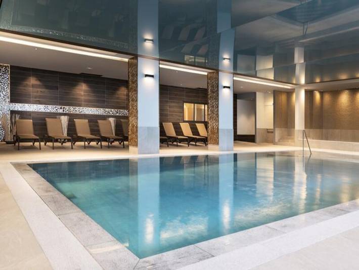 Chalet pour 6 personnes, avec balcon ainsi que piscine et sauna, adapté aux familles à Les Contamines-Montjoie