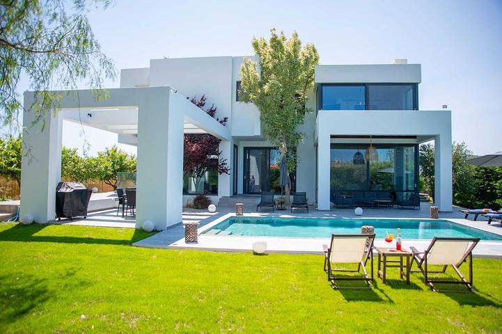 Ferienhaus für 7 Personen, mit Balkon und Garten