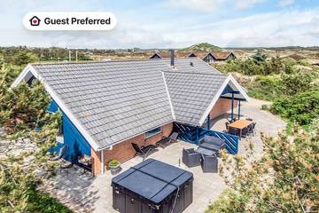 Ferienhaus für 8 Personen, mit Whirlpool und Pool sowie Terrasse und Sauna, mit Haustier in Henne Strand