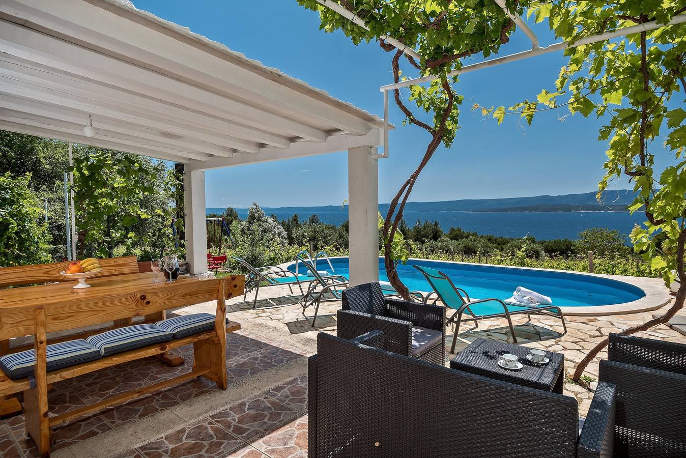 Two bedroom house with terrace and sea view Bol, Brač K-12228 in Zlatni rat, Bol