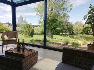 Location de vacances pour 12 personnes, avec vue sur le lac ainsi que vue et jardin, adapté aux familles à Bastogne