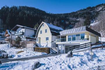 Chalet für 12 Personen, mit Garten und Ausblick sowie Seeblick, mit Haustier in Zell am See