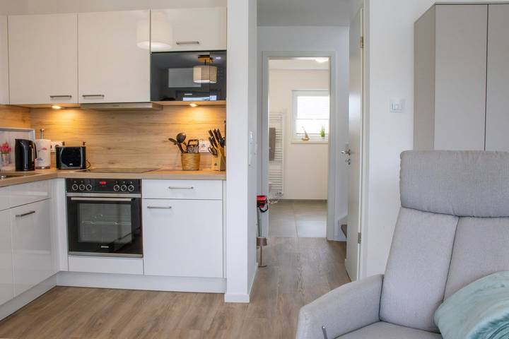 Ferienhaus für 4 Personen, mit Ausblick und Garten sowie Sauna und Seeblick in Butjadingen - 2