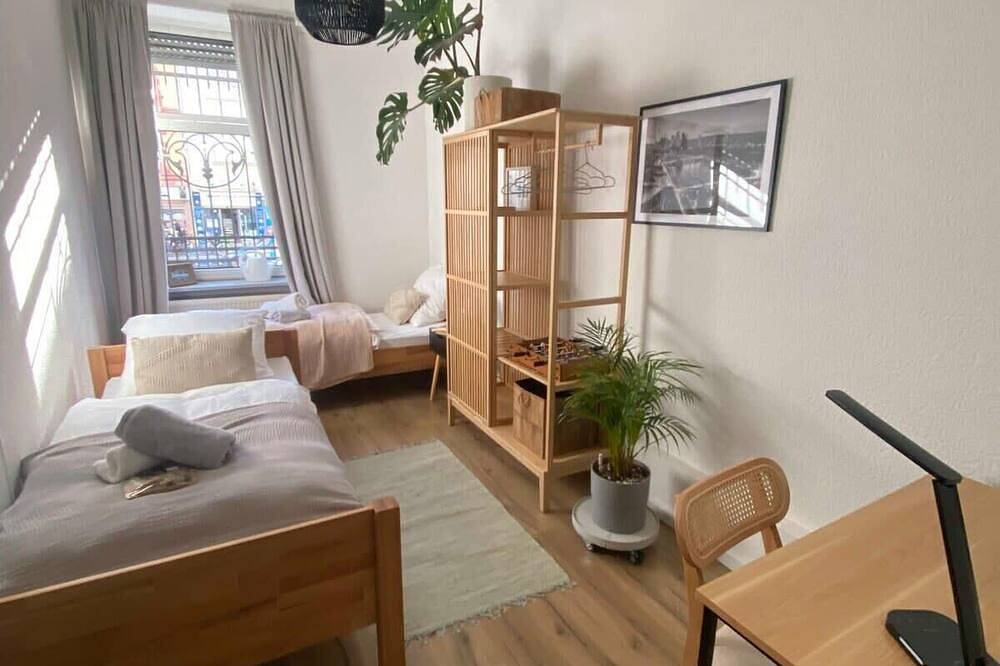 Apartamento entero, 🌿 Cozy City Oasis | Fairgrounds | Workspace | Click here to see more 👇 in Fráncfort del Meno, Hesse del Sur