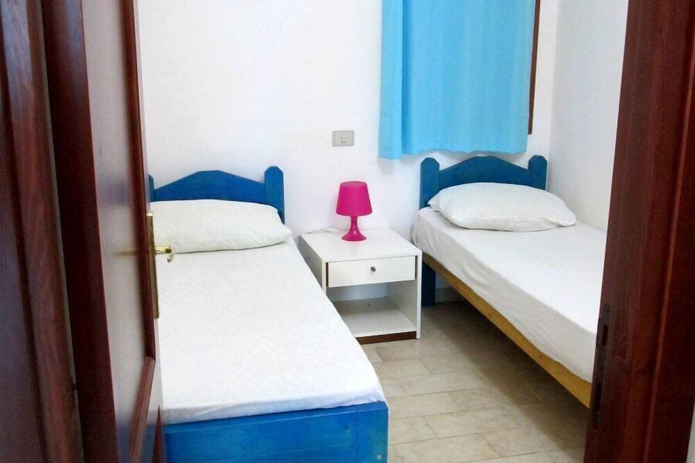 Geheel appartement, Comfortabel appartement met een eigen terras in de buurt van de zee en Villasimius in Solanas, Comune di Sinnai
