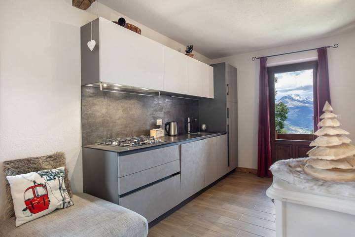Appartamento intero, Appartamento Pila Vacanze con Vista Montagna, Giardino in Comune e Wi-Fi in Plan Praz (Gressan), Comune di Gressan