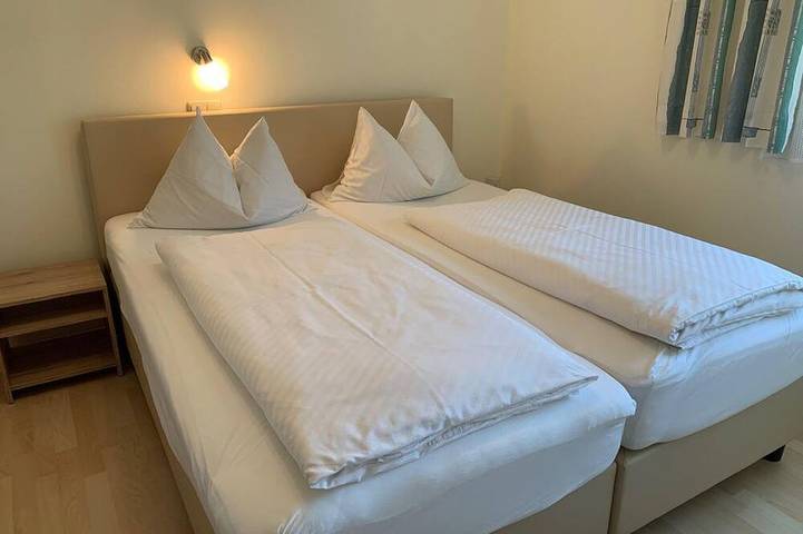 Ferienwohnung für 2 Personen, mit Balkon und Garten