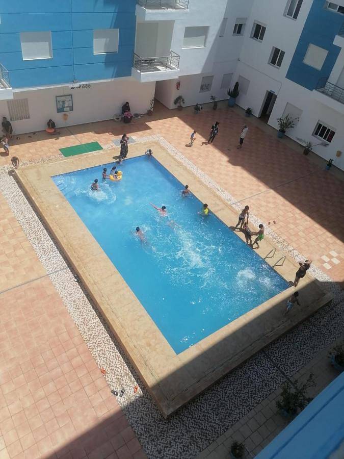 Appartement de vacances pour 6 personnes, avec vue et balcon ainsi que piscine et bassin pour enfant