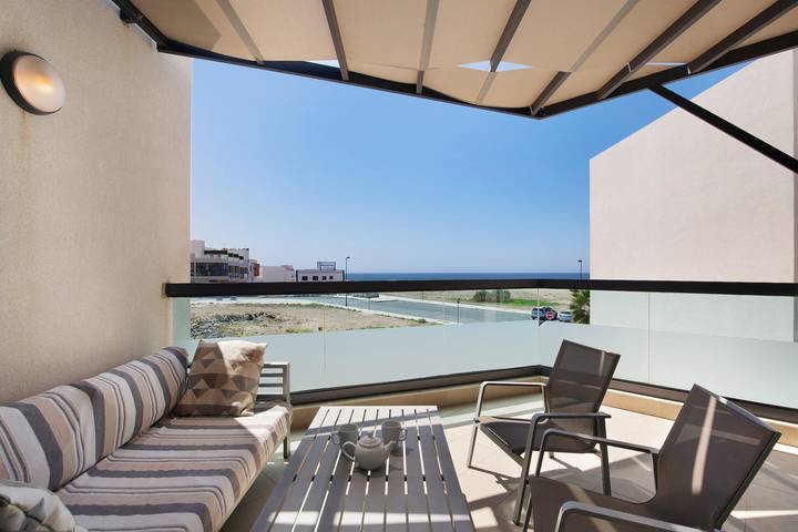 Entire apartment, Holiday Apartment "Nautilus Sea View" near Beach with Pool & Wi-Fi in El Cotillo, La Oliva