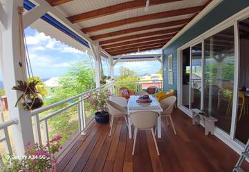 Gîte pour 3 personnes, avec vue et jardin dans Plage de Petite Anse