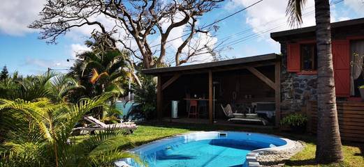 Cottage pour 8 personnes, avec piscine ainsi que jardin et vue dans La Saline (Saint-Paul)