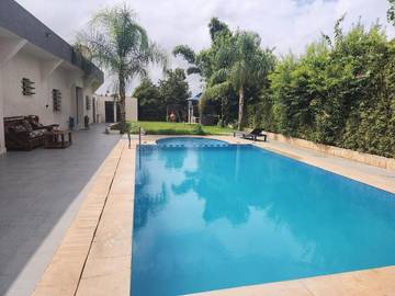 Location de vacances pour 10 personnes, avec sauna et vue ainsi que piscine et jardin, animaux acceptés dans Ain Cheggag