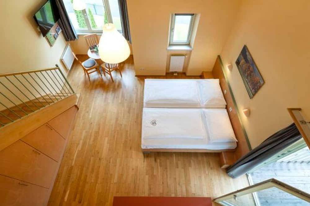 Five-bed room, shower, Wc, comfort - Jufa Hotel Kaprun in Kaprun, Pinzgau