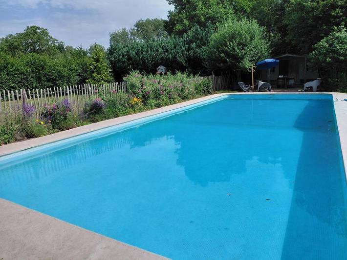 Appartement de vacances pour 2 personnes, avec jardin ainsi que vue et piscine