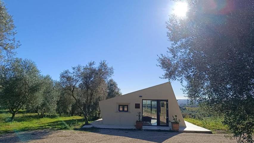 Ferienhaus für 2 Personen, mit Terrasse und Pool sowie Ausblick in Campagnatico