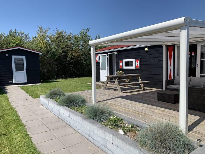 Chalet für 5 Personen, mit Balkon/Terrasse und Terrasse in Serooskerke