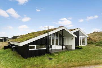 Ferienhaus mit Meerblick für 6 Personen, mit Whirlpool und Sauna sowie Terrasse in Grønhøj Strand