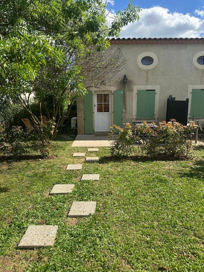 Appartement de vacances pour 5 personnes, avec Terrasse ainsi que Jardin et Piscine