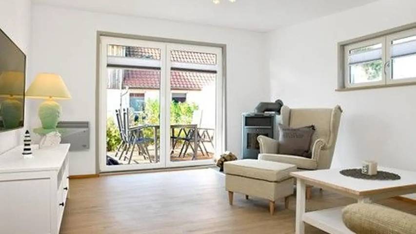 Ferienwohnung für 3 Personen, mit Balkon und Terrasse sowie Garten
