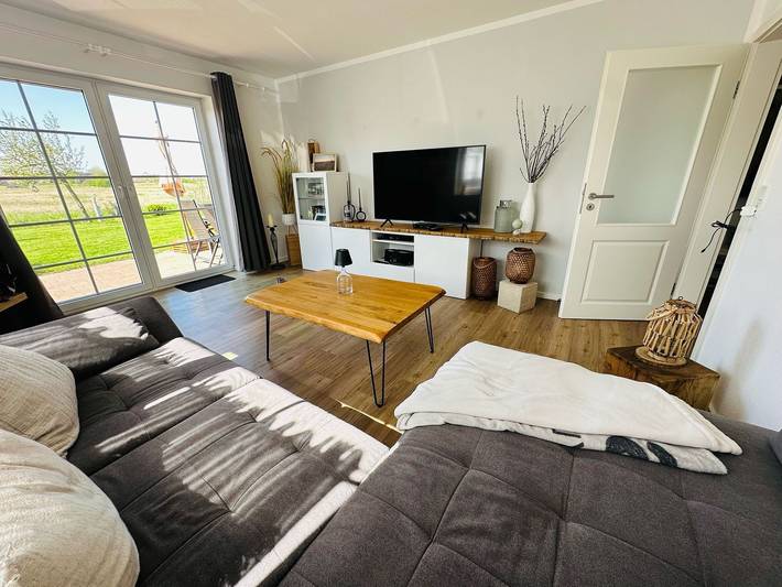 Ferienwohnung für 4 Personen, mit Terrasse und Garten sowie Ausblick in Greetsiel