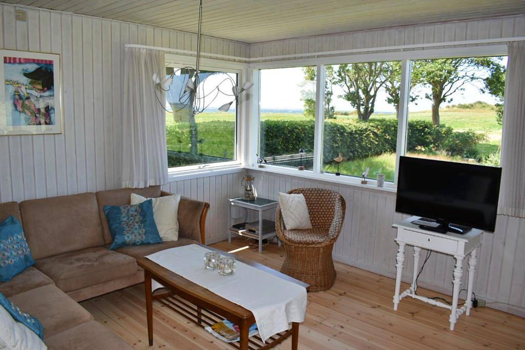 Gemütliches Ferienhaus mit Meerblick gelegen auf der malerischen Halbinsel Langø in Langø, Martofte