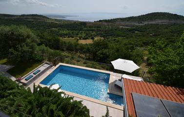 Ferienhaus mit Meerblick für 9 Personen, mit Terrasse und Garten in Kvarner Bucht