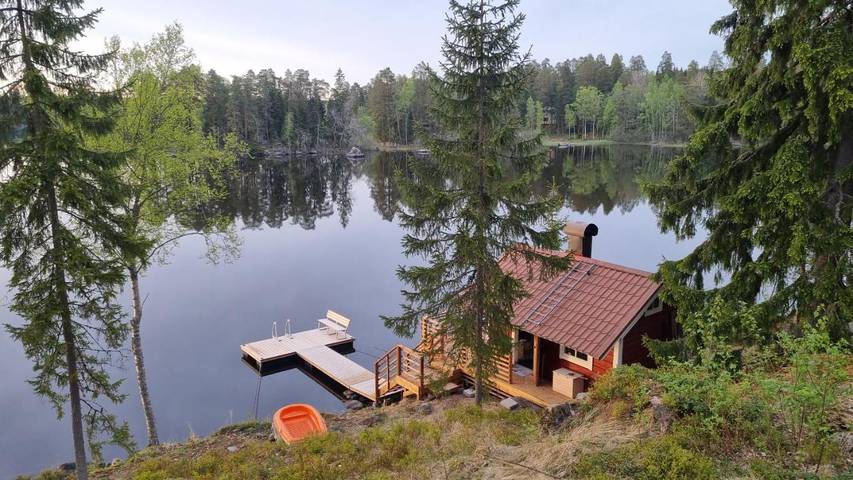 Ferienhaus für 5 Personen, mit Terrasse und Garten sowie Sauna und Seeblick