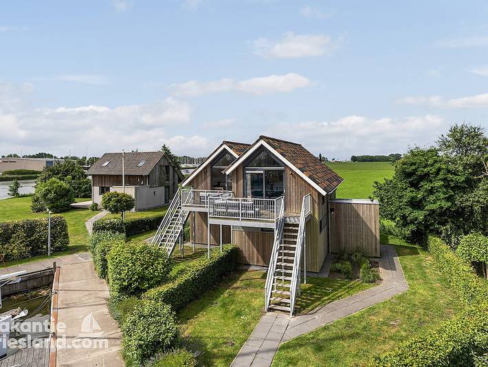 Ferienhaus für 4 Personen, mit Balkon/Terrasse und Terrasse sowie Garten und Sauna