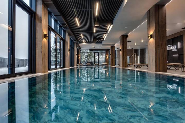 Hôtel pour 4 personnes, avec piscine et sauna ainsi que vue et terrasse, animaux acceptés