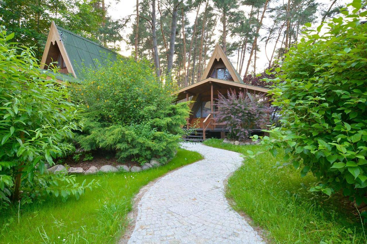 Ośrodek Wypoczynkowy Puszczyk Wolnostojące Domki Sosnowe z zadaszonym tarasem in Sieraków, Wielkopolska