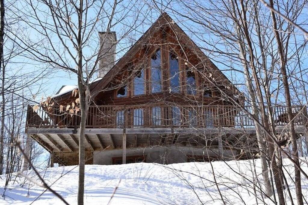 Le Montagnard # 057; Majestätisches Blockhaus im Wald und nur 20 Minuten vom Mont-Tremblant entfernt in Labelle, Québec