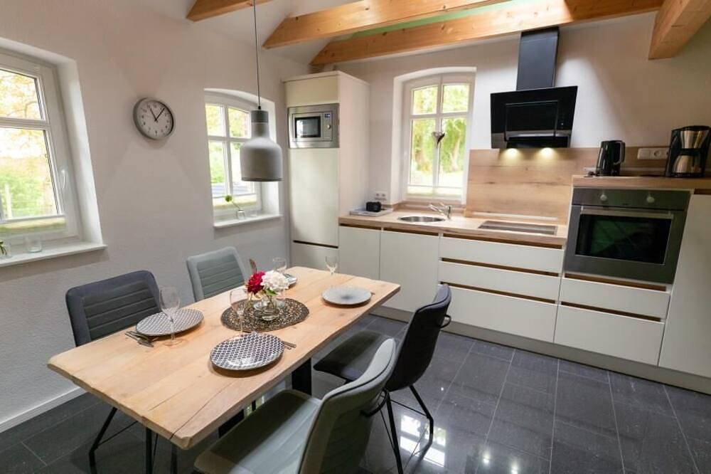 Ganze Wohnung, Friesenwind - Hochwertige Ferienwohnung mit Gartenoase in Utarp, Landkreis Wittmund