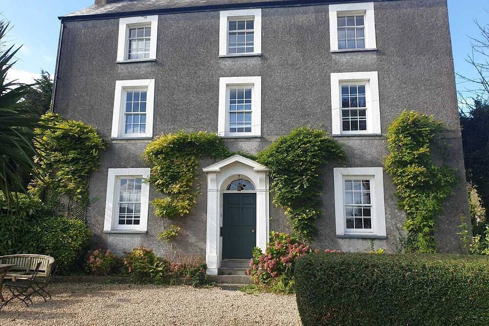 Property looking at Dylan Thomas boat house and Laugharne Castle. in Laugharne, Carmarthenshire