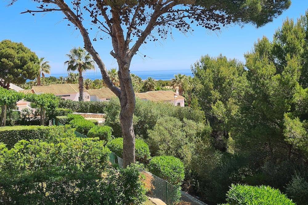 Apartamento entero, Apartment \"Orchidée\"- sea view, swimming pool, air conditioning, terrace. in Arenal d'en Castell, Es Mercadal