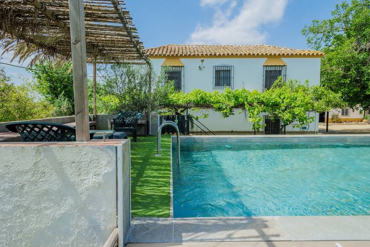 Casa de vacaciones para 15 personas, con Jardín en Alcalá de Guadaíra