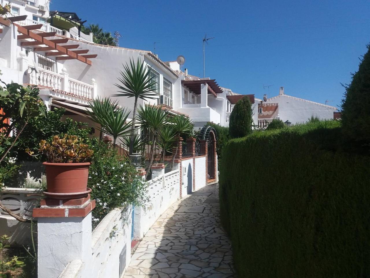 Chalet Adosado con Piscina Compartida, Wi-Fi y Aire Acondicionado en Cala del Moral in La Cala del Moral, Rincón de la Victoria