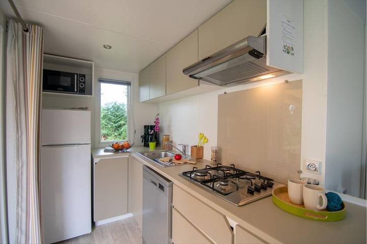 Mobil home pour 4 personnes, avec jardin ainsi que piscine et terrasse, adapté aux familles à Névez - 4