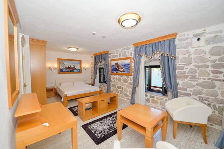 Waterfront Stone Home with Private Terrace & Direct Sea Access in Muo, Bay of Kotor
