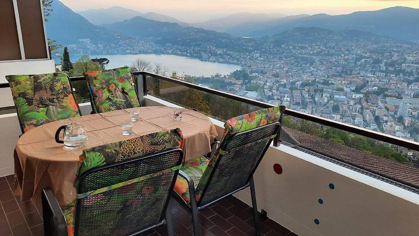 Ferienwohnung für 4 Personen, mit Sauna und Balkon sowie Garten und Seeblick in Lugano