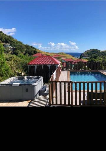 Gîte pour 2 personnes, avec jardin ainsi que piscine et jacuzzi à Terre-de-Haut