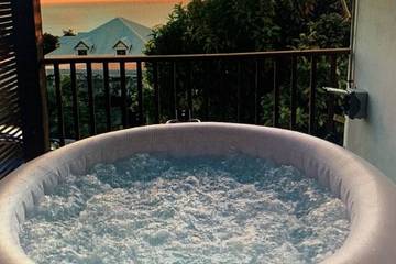 Gîte pour 4 personnes, avec terrasse et jardin à Baillif