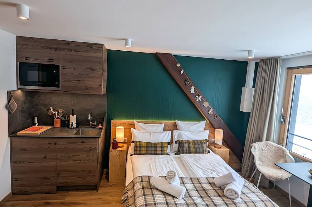 Entire apartment, L'ecorce - studio no. 2, top of the range in Orbey, Parc naturel régional des Ballons des Vosges