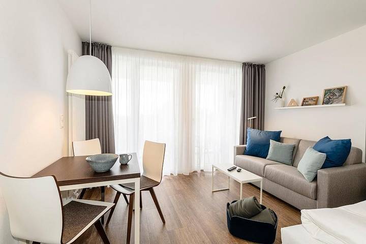 Ferienwohnung für 3 Personen, mit Balkon und Kinderpool sowie Sauna in Bensersiel