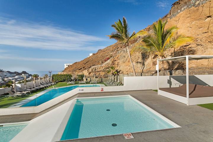 Apartamento entero, Apartamento de vacaciones 'Dreams' con vistas al mar, piscina compartida y Wi-Fi in Puerto Rico (Gran Canaria), Mogán
