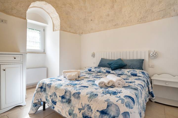 Appartamento intero, Appartamento 'Trullo Degli Anelli In Masseria' con piscina condivisa, Wi-Fi e aria condizionata in Cisternino, Salento