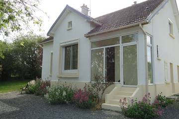 Gîte pour 8 personnes, avec jardin à Saint-Laurent-sur-Mer